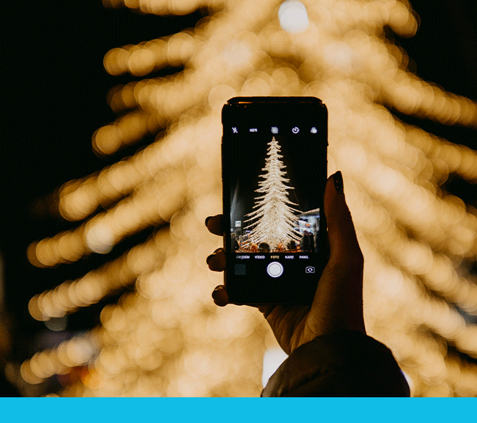 iPhone taking photo of Christmas tree